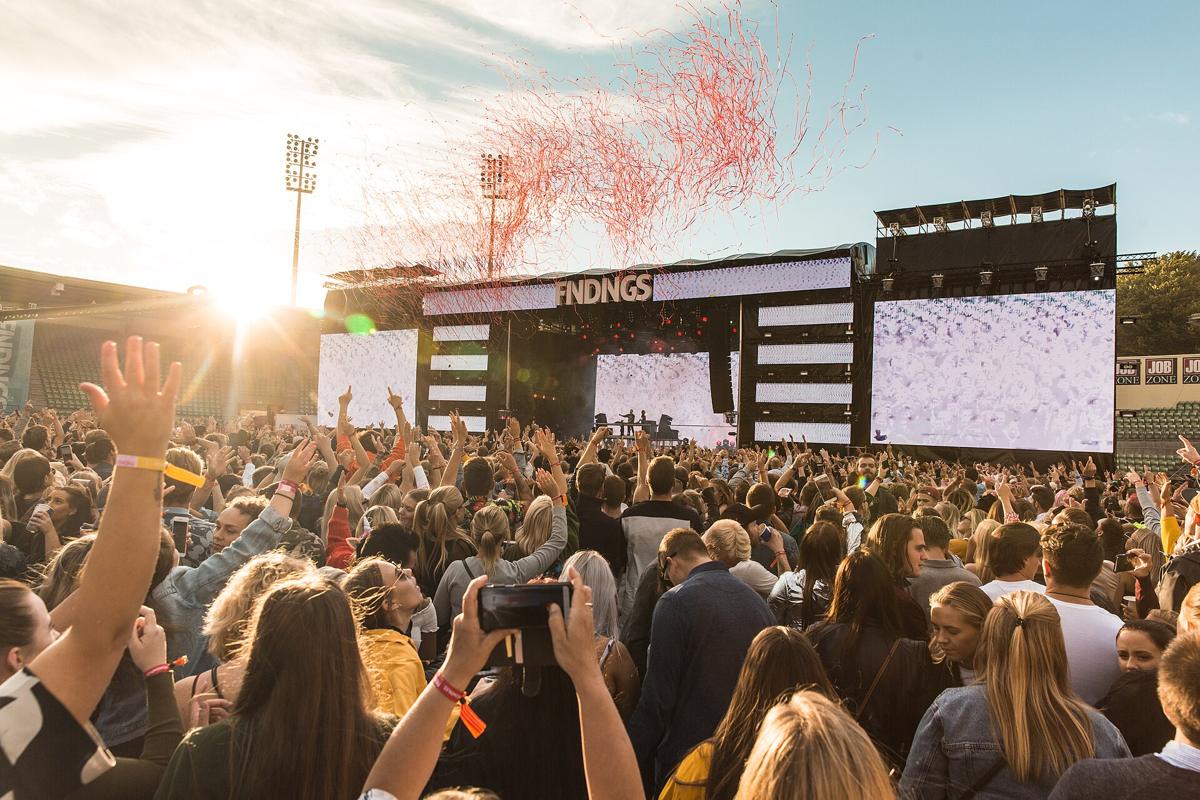 A festival crowd in front of the main stage